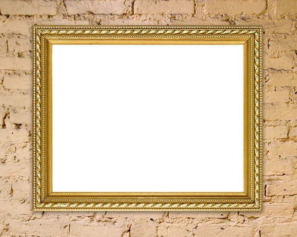 Golden frame on brick stone wall background — Stock Photo, Image