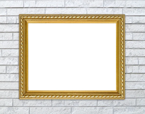 Golden frame on brick stone wall background — Stock Photo, Image