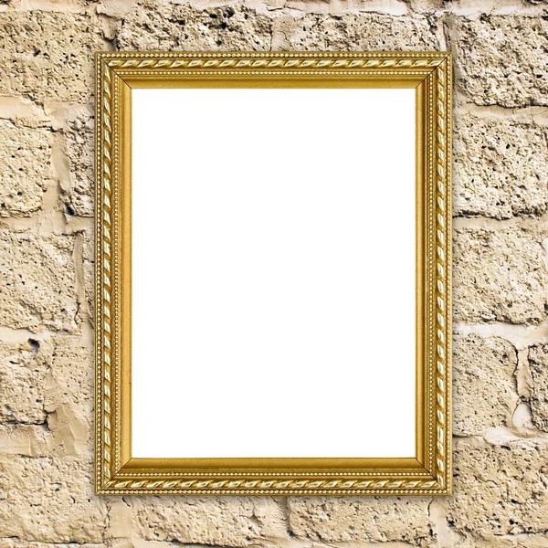 Golden frame on brick stone wall background — Stock Photo, Image