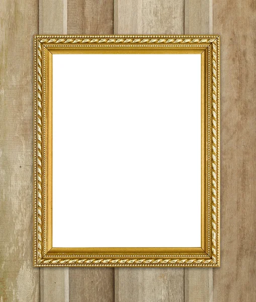 Moldura dourada no fundo da parede de madeira — Fotografia de Stock