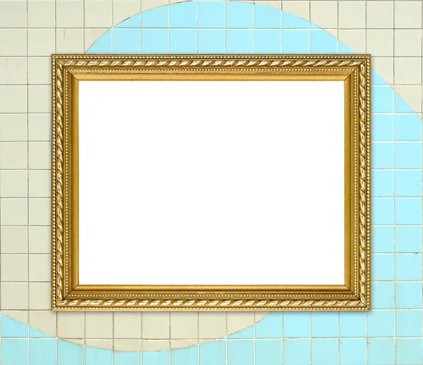 Gouden frame op baksteen stenen muur achtergrond — Stockfoto