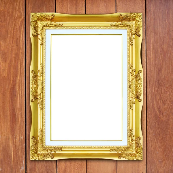 Gouden frame op houten muur achtergrond — Stockfoto