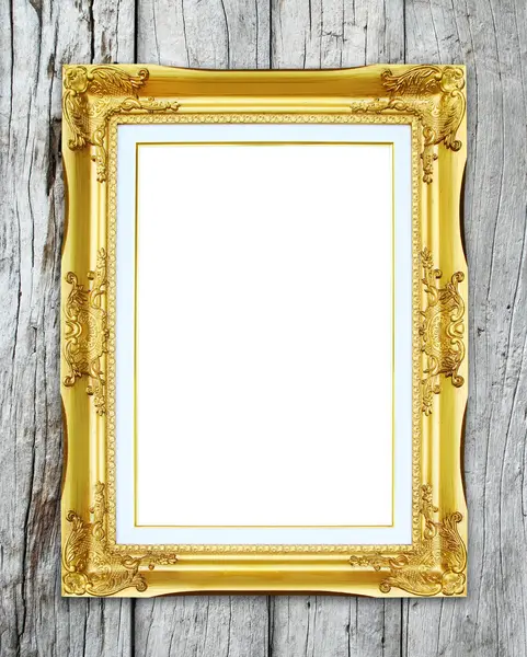 Golden frame on wood wall background — Stock Photo, Image