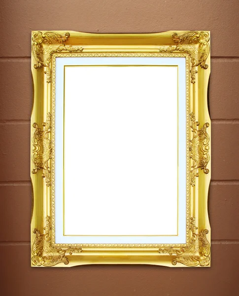 Golden frame on cement wall background — Stock Photo, Image