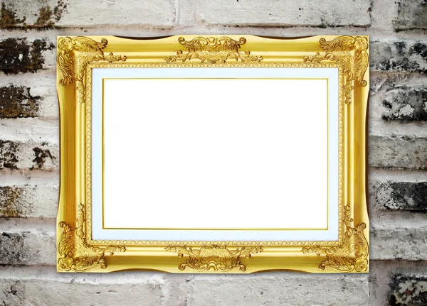 Золота рамка на фоні цегляної кам'яної стіни — стокове фото