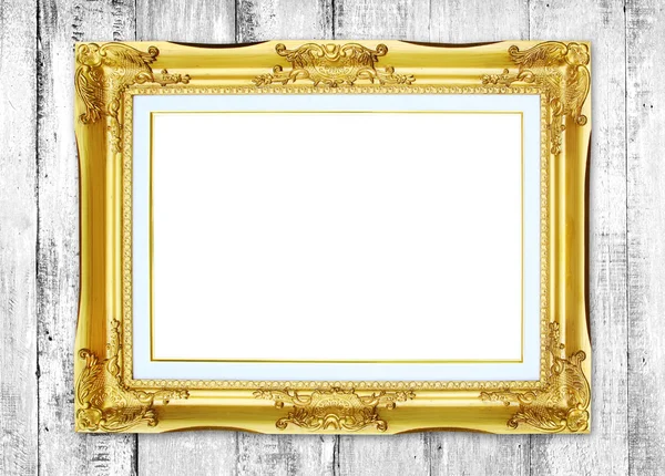 Golden frame on wood wall background — Stock Photo, Image