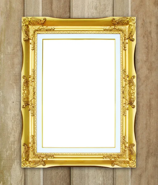 Cornice dorata su fondo parete in legno — Foto Stock