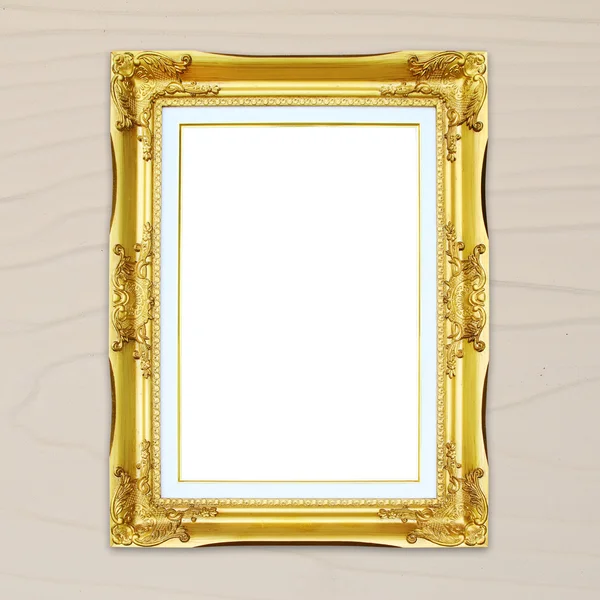 Golden frame on wood wall background — Stock Photo, Image