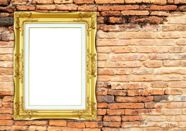 Gouden frame op baksteen stenen muur achtergrond — Stockfoto