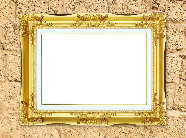 Cadre doré sur fond de mur en pierre de brique — Photo