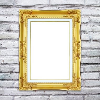 tuğla duvar zemin üzerine altın çerçeve