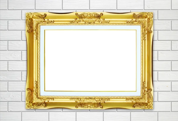 Gouden frame op baksteen stenen muur achtergrond — Stockfoto