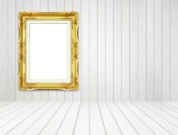 Golden frame in room with white wood wall and wood floor backgro — Stock Photo, Image