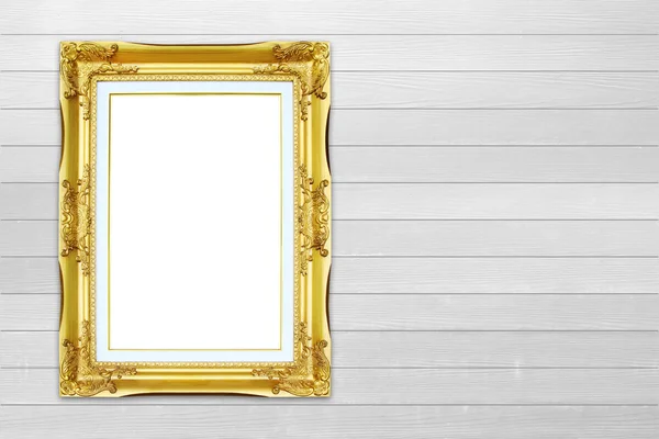 Golden frame on wood wall background — Stock Photo, Image