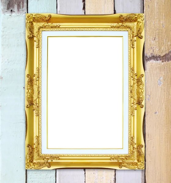 Marco dorado sobre fondo de pared de madera —  Fotos de Stock