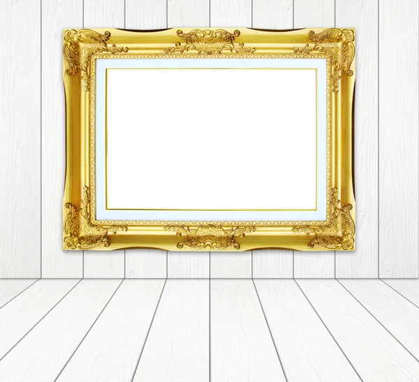 Quadro dourado no quarto com parede de madeira branca e backgro chão de madeira — Fotografia de Stock