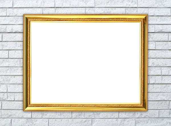 Golden frame on brick stone wall background — Stock Photo, Image