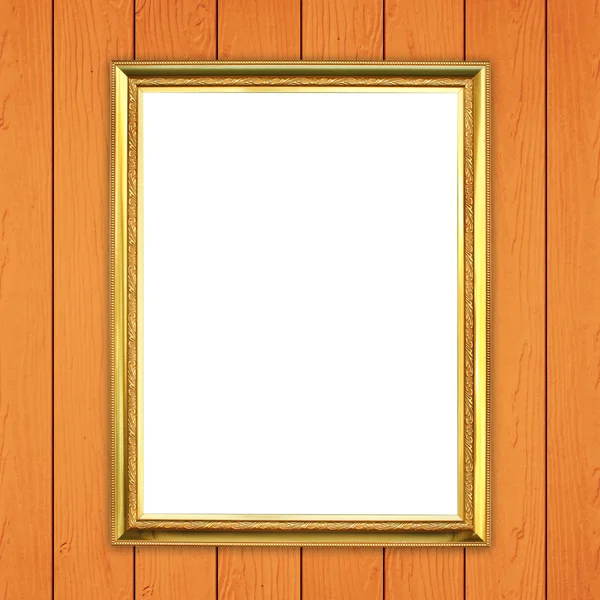 Golden frame on wood wall background — Stock Photo, Image