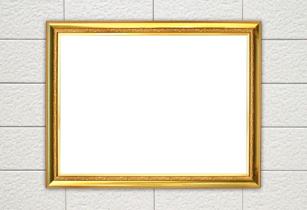 Golden frame on brick stone wall background — Stock Photo, Image