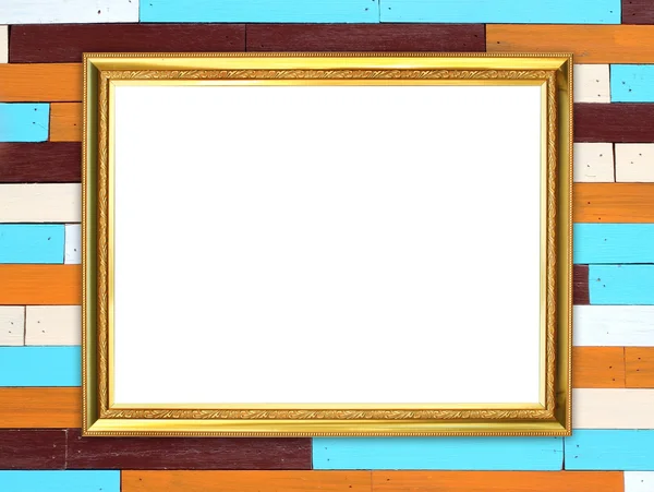 Golden frame on wood wall background — Stock Photo, Image