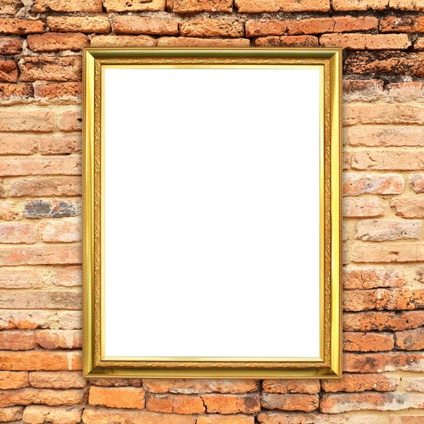 Moldura dourada no fundo da parede de pedra de tijolo — Fotografia de Stock
