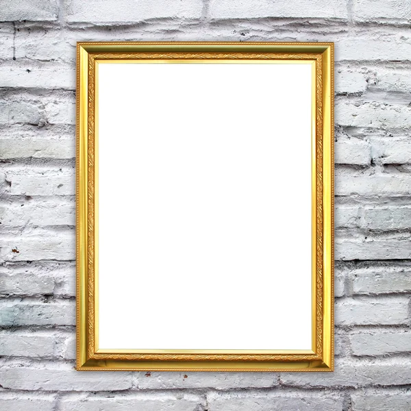 Golden frame on brick stone wall background — Stock Photo, Image