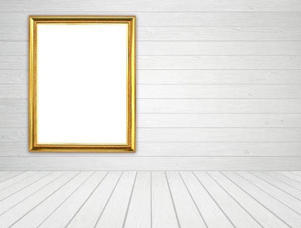 Cornice dorata in camera con parete in legno bianco e pavimento in legno backgro — Foto Stock