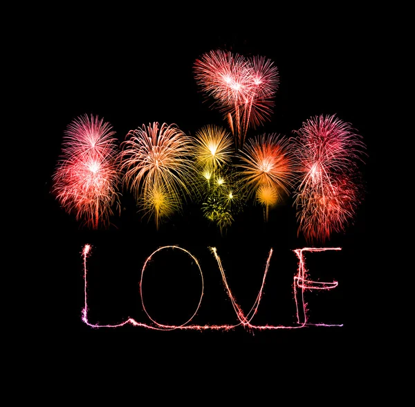 Love sparkler firework light alphabet with fireworks — Stock Photo, Image