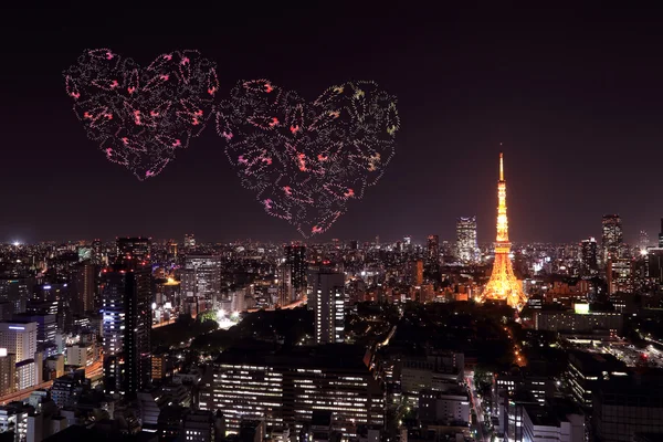 Heart sparkle Fireworks celebrating over Tokyo cityscape at nigh — Stock Photo, Image