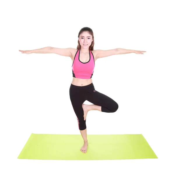 Junge Frau macht Yoga-Übungen — Stockfoto