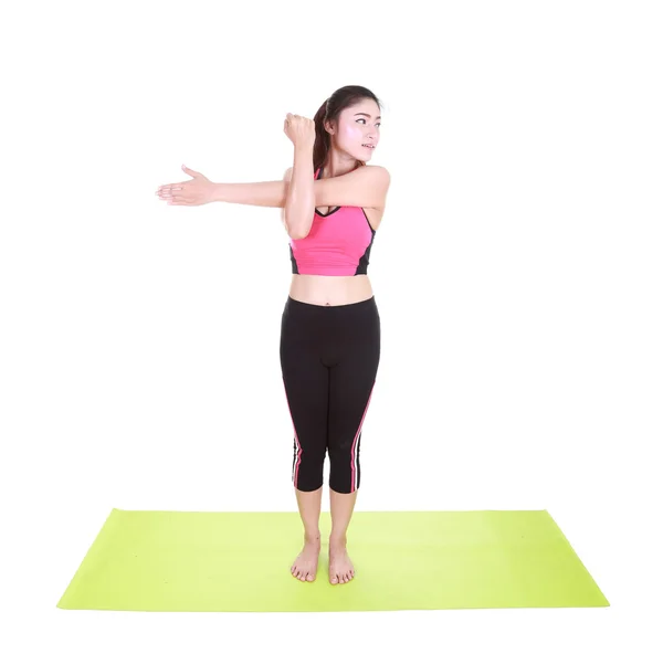 Ung kvinna som tränar yoga — Stockfoto