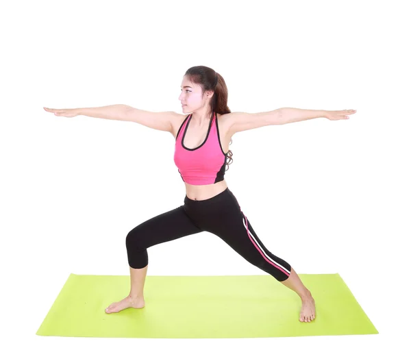 Junge Frau macht Yoga-Übungen — Stockfoto