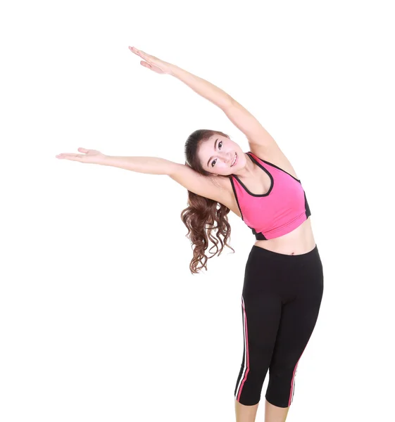 Mujer joven haciendo ejercicio de yoga — Foto de Stock