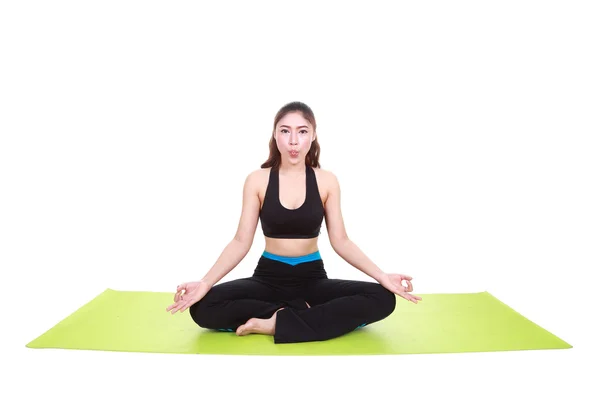 Young woman doing yoga exercise (tongue was wrapped) — Stock Photo, Image