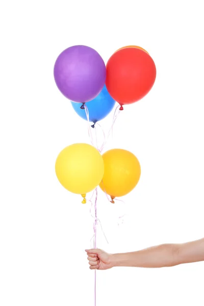 Hand with colorful balloons — Stock Photo, Image