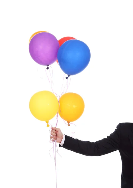 Business hand with colorful balloons — Stock Photo, Image