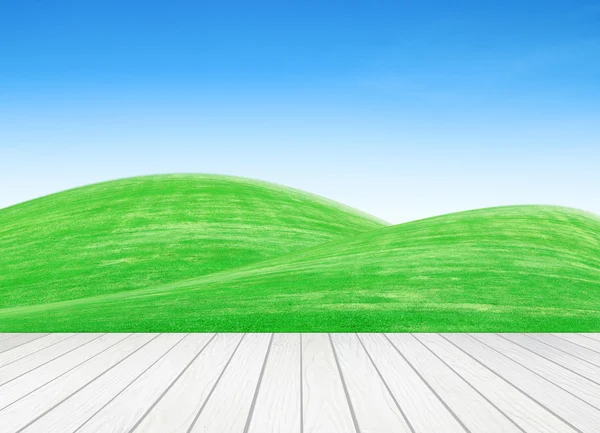 White wood terrace with grass field — Stock Photo, Image