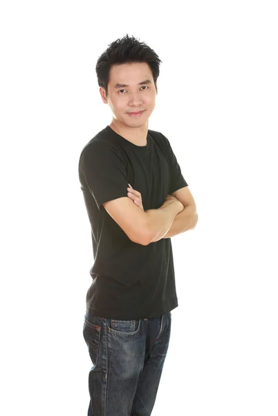 Man with arms crossed, wearing black t-shirt — Stockfoto