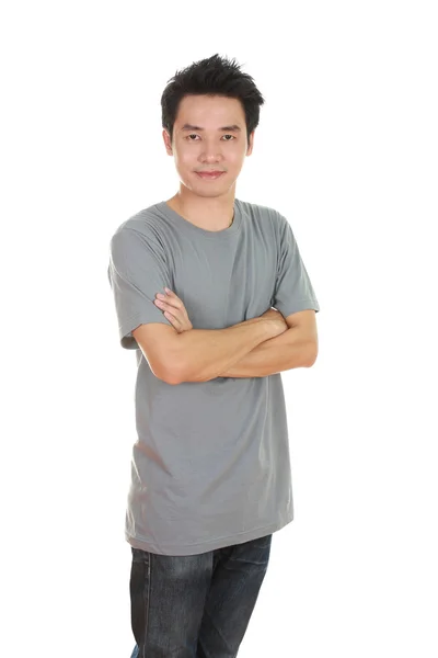 Man with arms crossed, wearing t-shirt — Stock Photo, Image