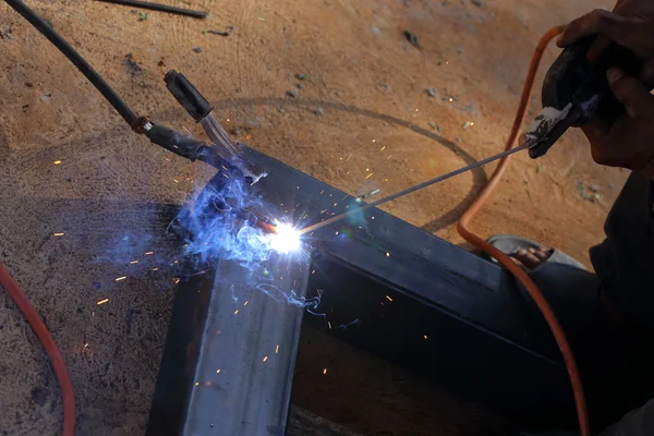 Hand of worker welding metal — Stock Photo, Image