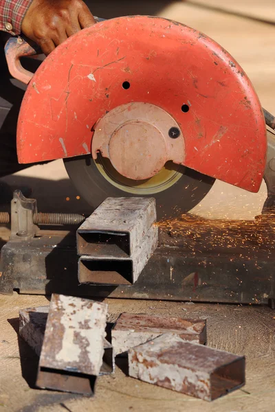 Cutting a metal and steel with compound mitre saw with sharp — Stock Photo, Image