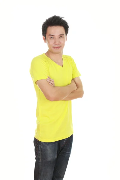 Man with arms crossed, wearing t-shirt — Stock Photo, Image