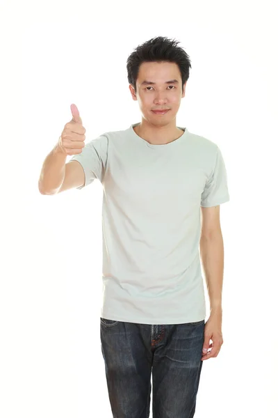 Man in blank t-shirt with thumbs up — Stock Photo, Image