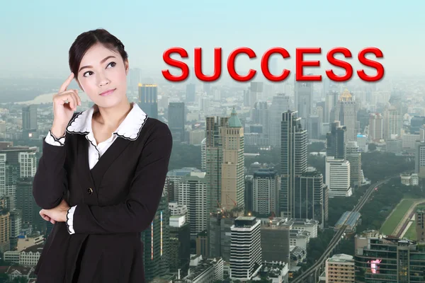 Business woman thinking about "success" — Stock Photo, Image