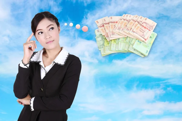 Mujer de negocios pensando en dinero —  Fotos de Stock