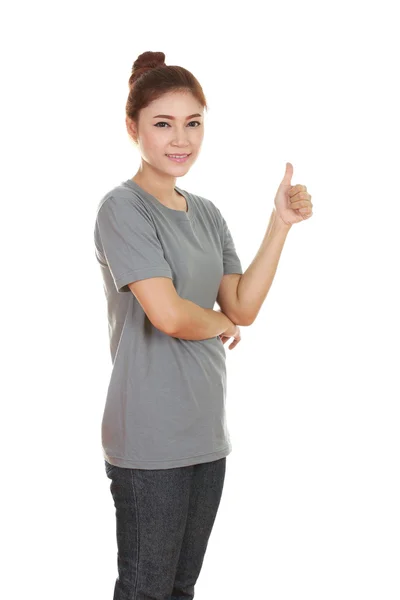 Kvinna i blank t-shirt med tummen upp — Stockfoto