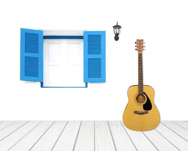 Guitarra con ventana en pared de cemento —  Fotos de Stock