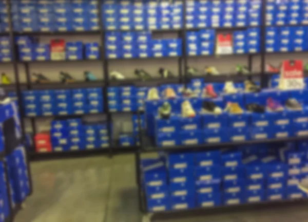 Immagine sfocata di un negozio di scarpe — Foto Stock