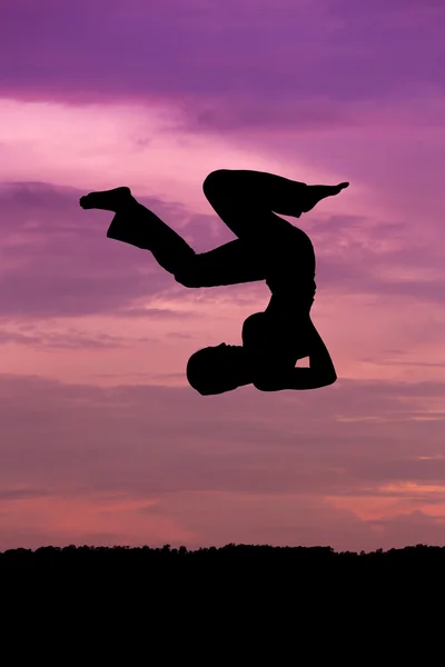 Silhouette of woman jumping — Stock Photo, Image