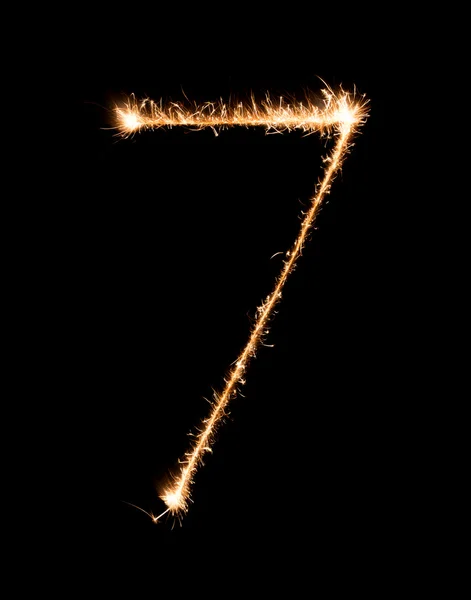7 dígitos siete hechos de bengalas de fuegos artificiales por la noche —  Fotos de Stock